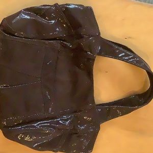Brown patent leather bag by Atalanta. Made in USA.